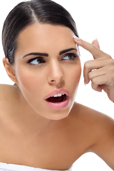 Surprised woman looking problem on her skin — Stock Photo, Image