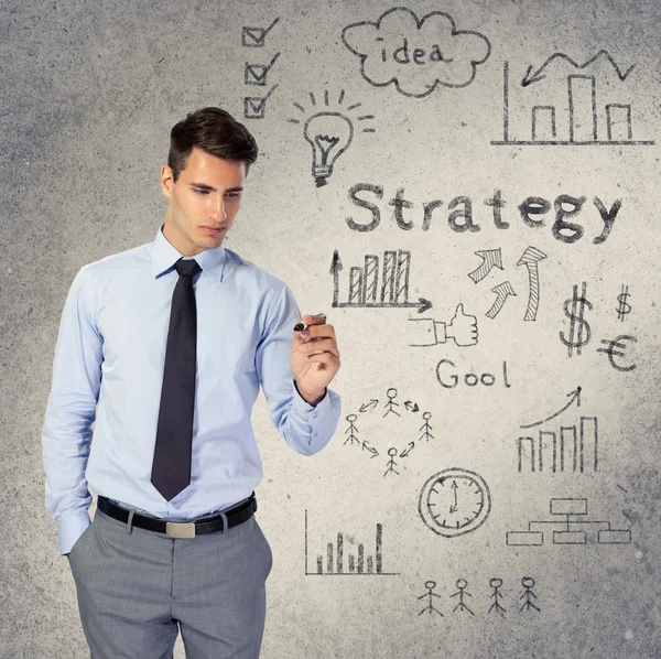 Businessmen drawing business strategy — Stock Photo, Image
