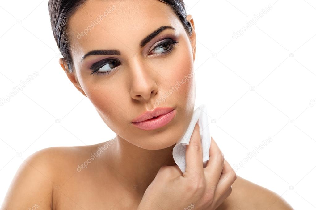 woman cleaning skin