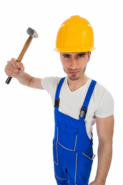 Angry construction worker with a hammer — Stock Photo, Image