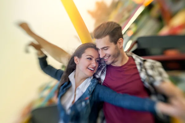 Couple enjoy in riding ferris wheel — Stock Photo, Image