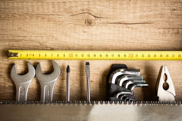 Wooden desk with tools and copy space Royalty Free Stock Photos