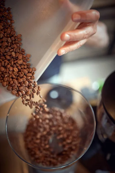 Hands Holding Container Pouring Fragrant Aromatic Coffee Beans Grinder Apparatus — Stock Photo, Image