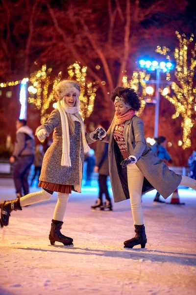 Two Female Friends Posing Photo While Skating Ice Skating Rink — Stock Photo, Image