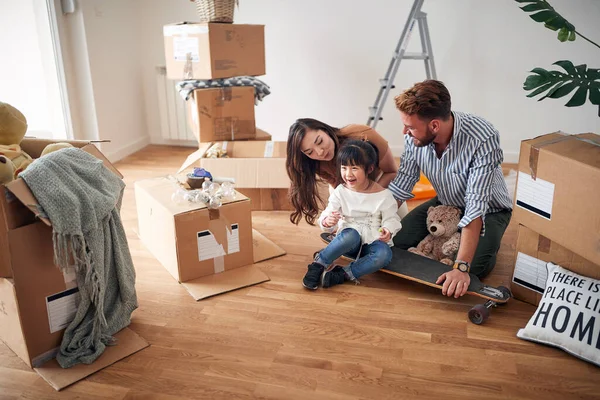 Young Parents Playing Talking Daughter New Apartment Copy Space — Stock Photo, Image