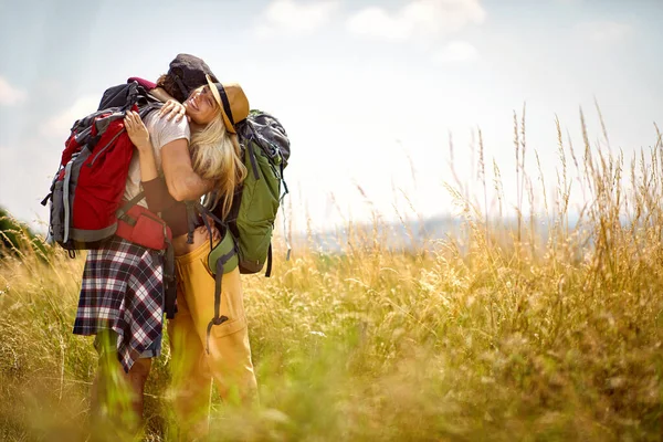 Young Couple Hug While Walking Beautiful Sunny Day Nature Hiking — Stock Photo, Image