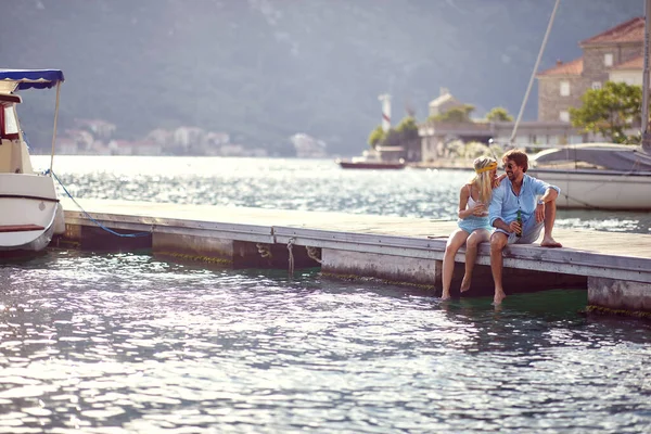 Couple Sitting Wooden Jetty Sea Having Drink Flirting Boats City — Stock Photo, Image