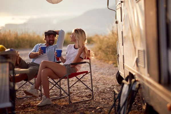 Couple Sunset Cheering Drinks Sitting Front Camper Fun Togetherness Nature — стоковое фото