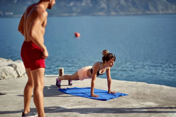 Young Couple Working Out Water Stretching Upward Facing Dog Yoga — Photo