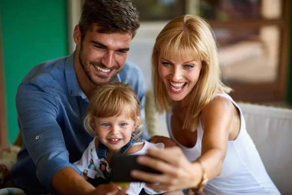 Cheerful Family Making Photo Together — Zdjęcie stockowe