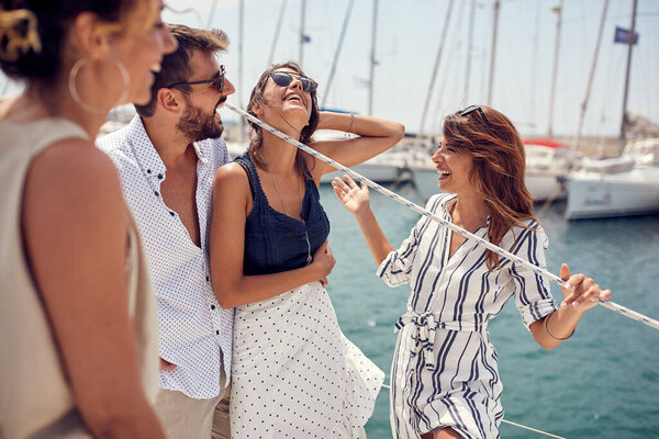 Group Young Handsome Models Having Friendly Talk While Riding Yacht Stock Image
