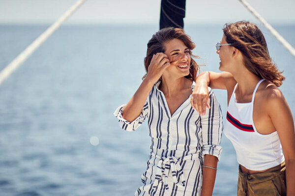 Two Handsome Female Models Enjoying Sun Wind Yacht Beautiful Sunny Royalty Free Stock Images