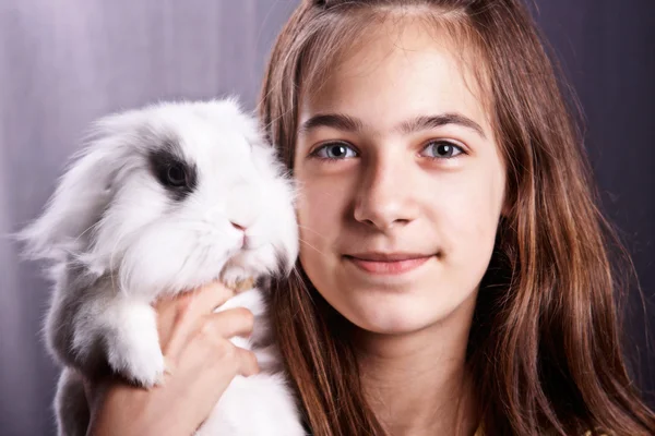 Girl with a rabbit — Stock Photo, Image