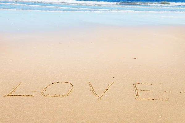 Love message on sand Stock Photo