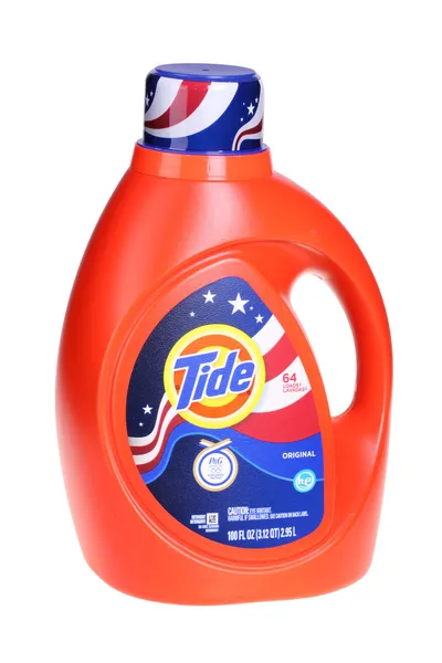 Garrafa laranja brilhante de detergente de lavanderia Tide — Fotografia de Stock