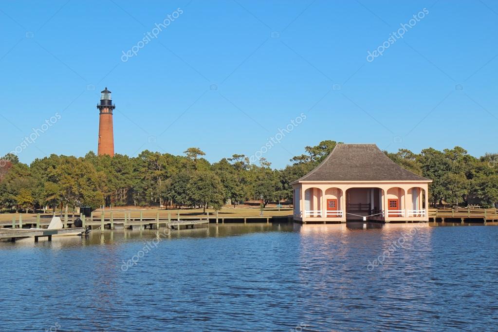 The Currituck Beach Lighthouse and boathouse near Corolla, North Stock