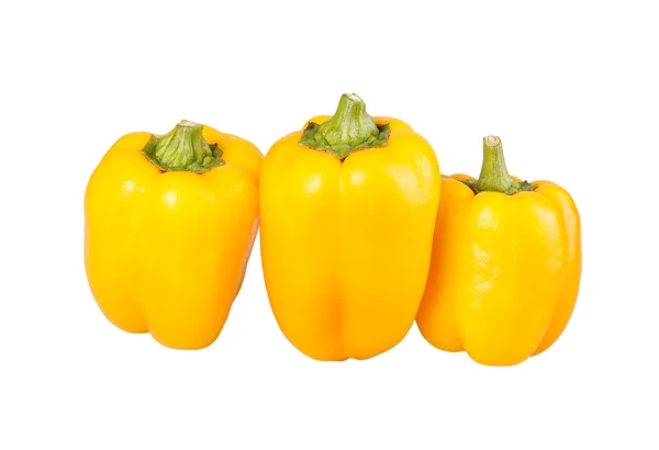 Three yellow bell peppers isolated against white — Stock Photo, Image