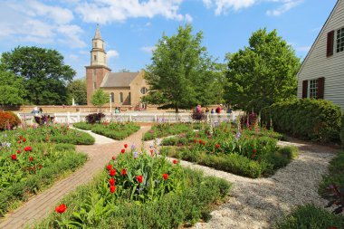 Gardens at Colonial Williamsburg in front of Bruton Parish Churc clipart