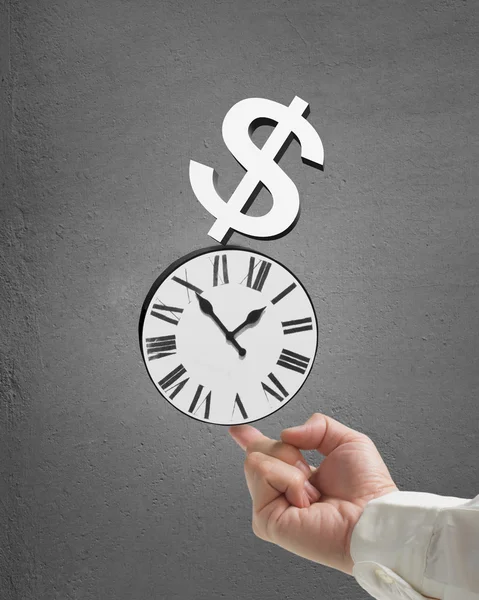 Man use index finger to balacne stacked clock and money in concr — Stock Photo, Image