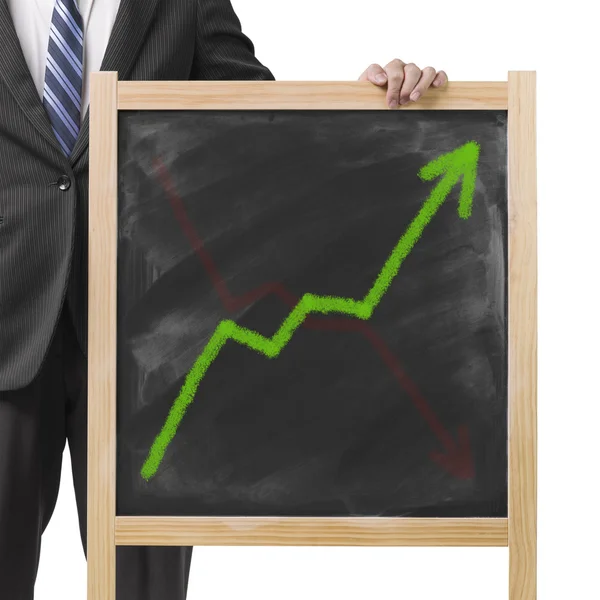 Businessman hold dirty wooden chalk board with going up green tr — Stock Photo, Image