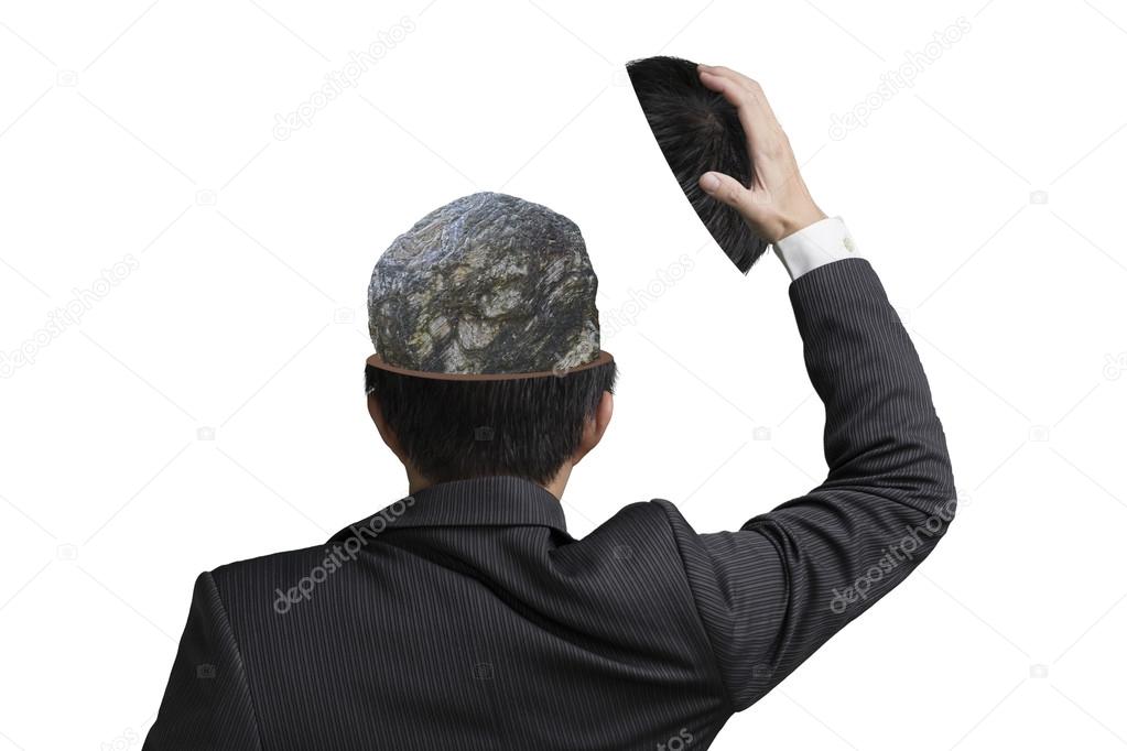 Hard stone covered with lines inside businessman head in wihte b