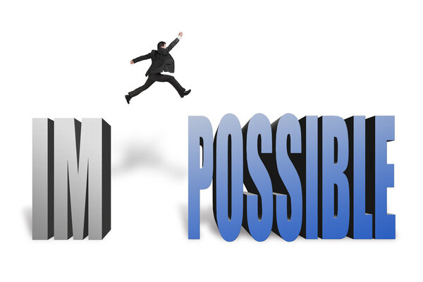 Businessman jumping to concrete word possible in white backgroun