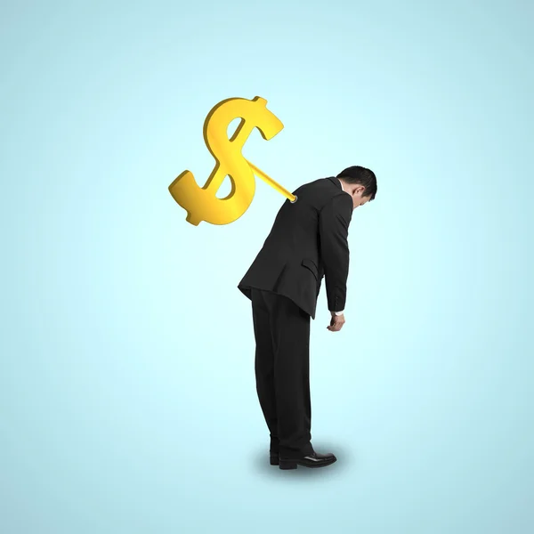 Businessman with money symbol winder on his back — Stock Photo, Image