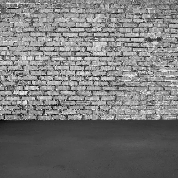 Цегляна стіна і бетонна підлога — стокове фото