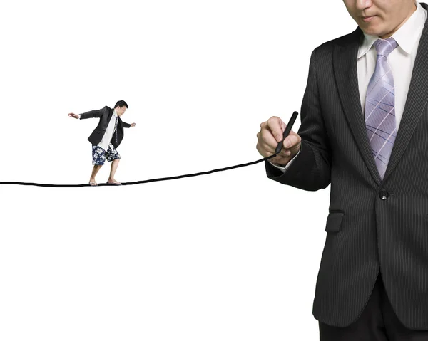 Businessman drawing line with another balancing on it — Stock Photo, Image