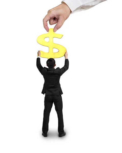 Hand halten 3d goldenes Geld Symbol mit Geschäftsmann — Stockfoto