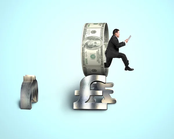 Businessman jumping through money circle — Stock Photo, Image