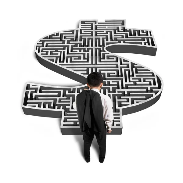 Businessman standing front of 3d money shape maze — Stock Photo, Image