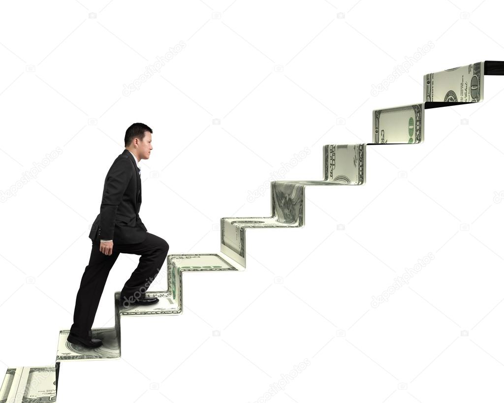 businessman walking on money stairs