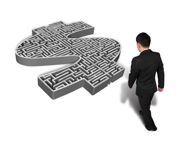 Man walking toward 3d money shape maze — Stock Photo, Image