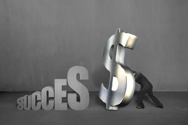 Pushing metal money symbol for success — Stock Photo, Image