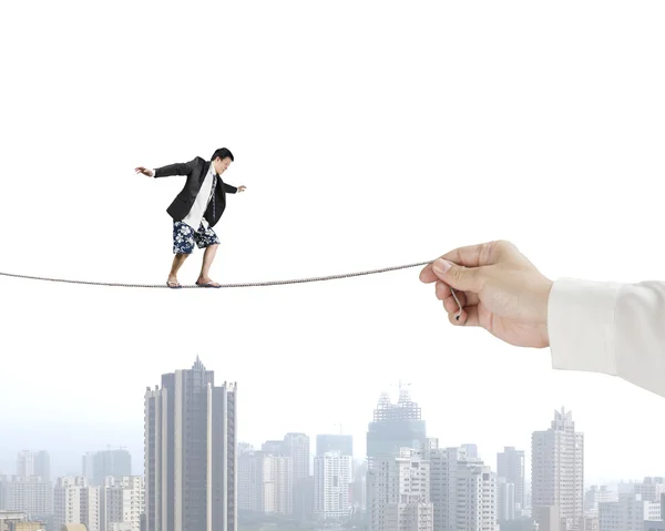 Man balancing on rope — Stock Photo, Image