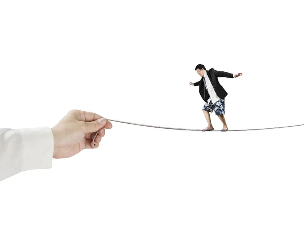 Balancing on rope with hand holding — Stock Photo, Image