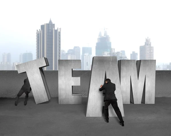 Moving TEAM concrete word together — Stock Photo, Image