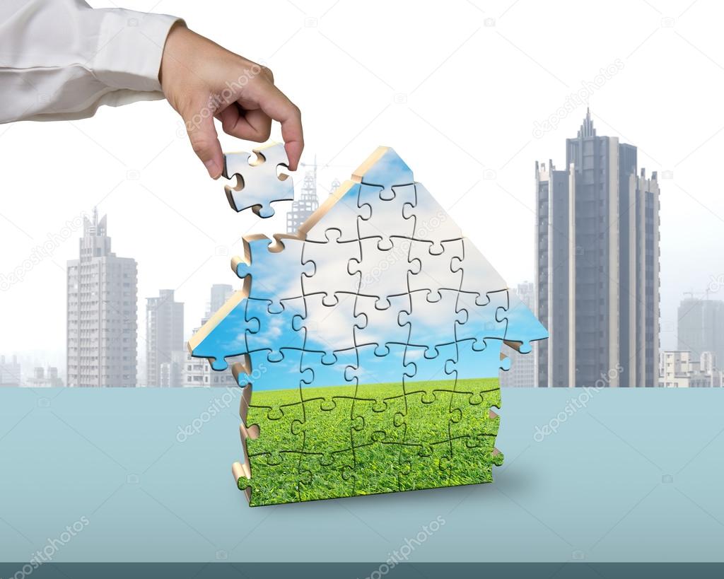 Assembling puzzles in house building shape