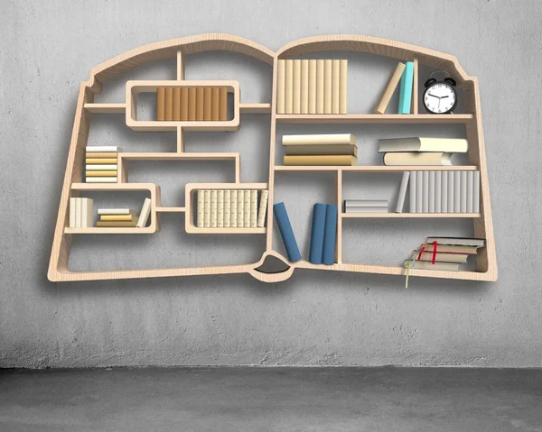 Book shape bookshelf on concrete wall — Stock Photo, Image