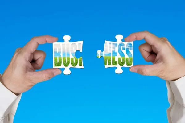Connecting two puzzles for green business — Stock Photo, Image