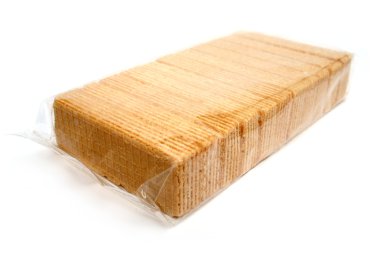 Wafers with a cream in polyethylene packing clipart