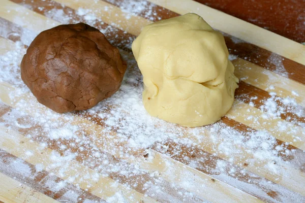 Pasta di cioccolato e vaniglia su una tavola — Foto Stock