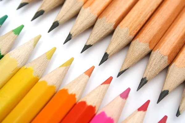 Pencils for plotting against color brothers — Stock Photo, Image