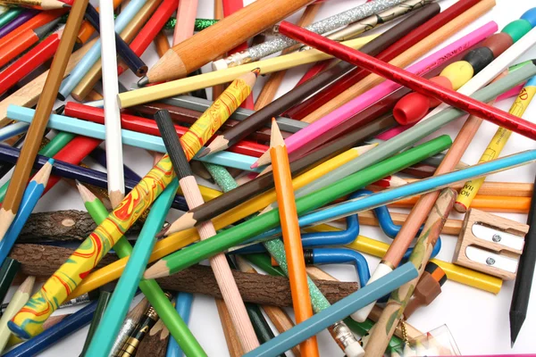 Collection of multi-colour pencils and wooden sharpener — Stock Photo, Image