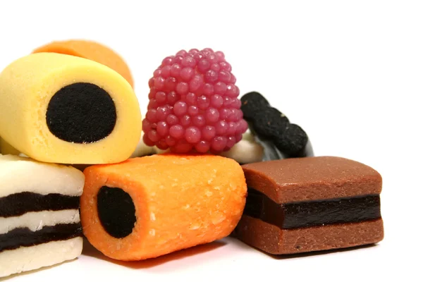 Hoop van fruit snoepjes in de vorm van rollen van verschillende kleur 5 — Stockfoto