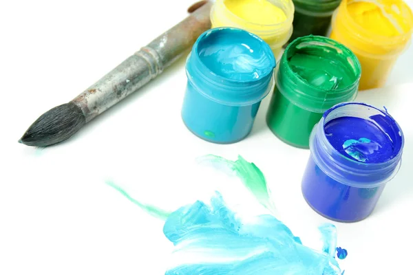 Tools of the artist: paints, brush and a paper — Stock Photo, Image