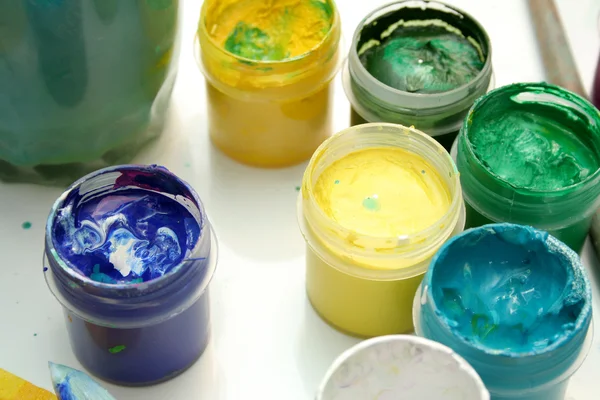 Jars with multi-coloured gouache — Stock Photo, Image