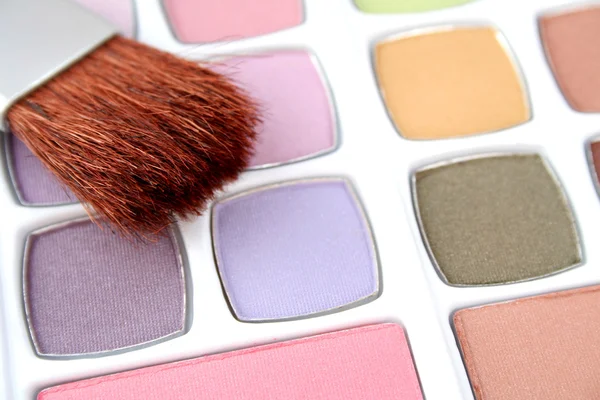 Eyeshadows and brush — Stock Photo, Image