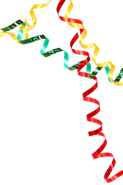 Tinsel de célébration de couleur rouge, verte et jaune sur blanc — Photo